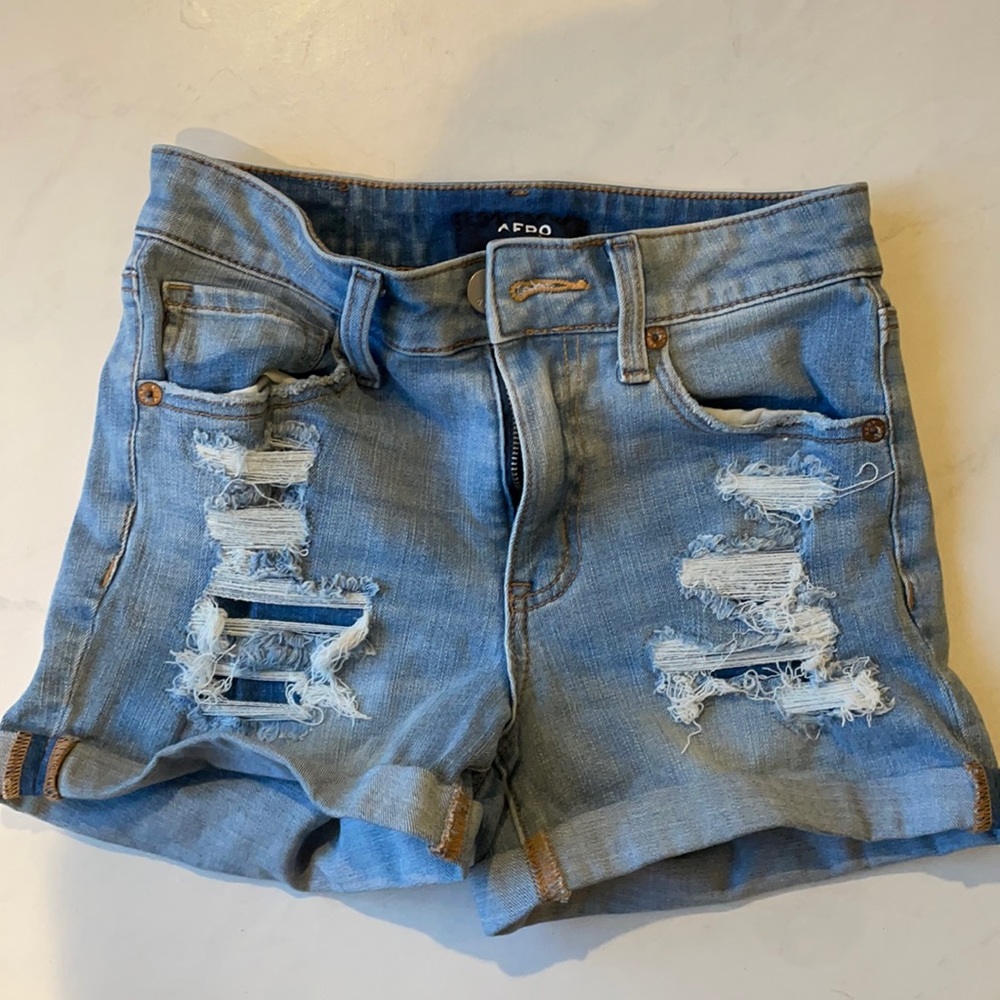 Aero light blue high rise Jean shorts with rips